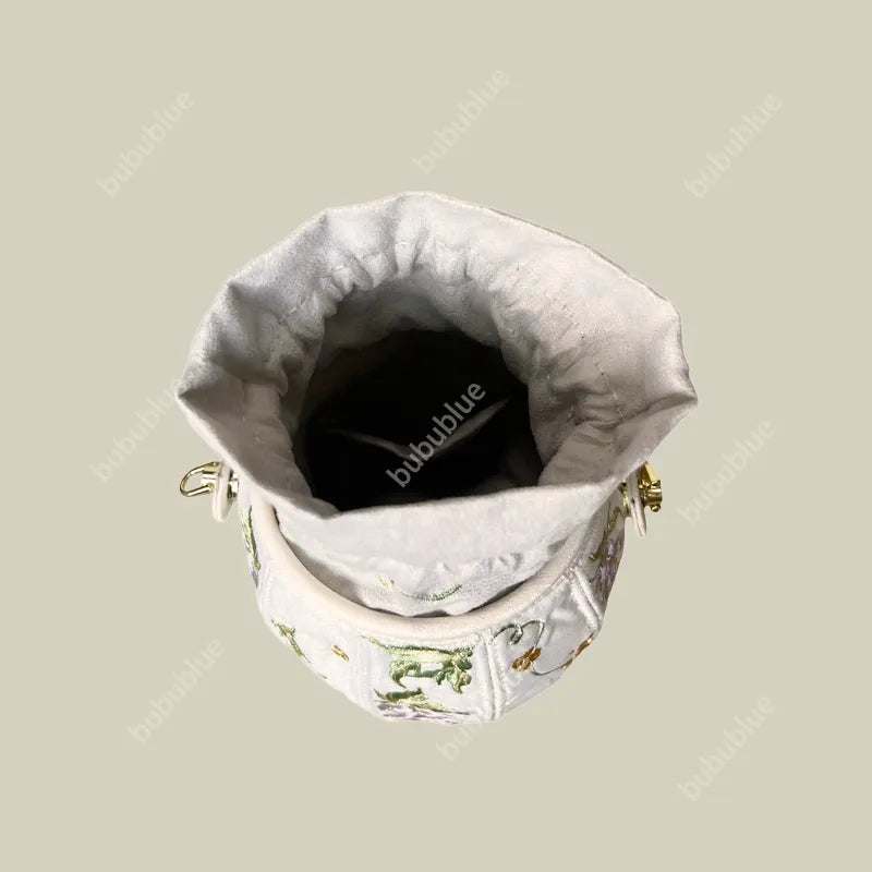 Wisteria Embroidered Drawstring Bucket Bag in Cream Satin