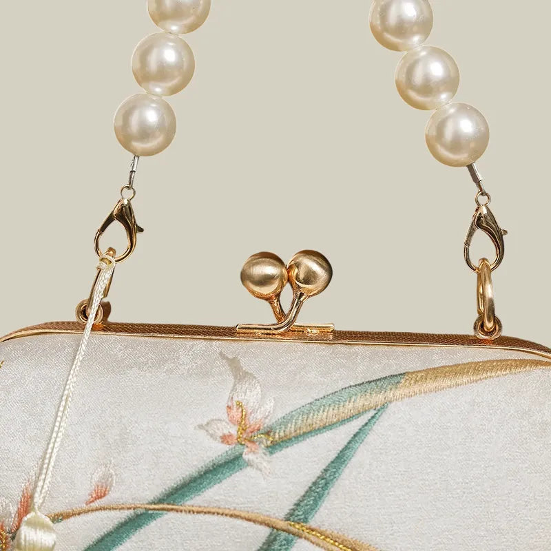 Orchid Bloom Embroidered Kiss-Lock Handbag with Pearl Handle