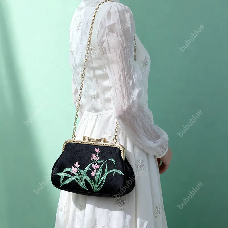 Vintage Orchid Embroidered Handbag with Metal Butterfly Lock