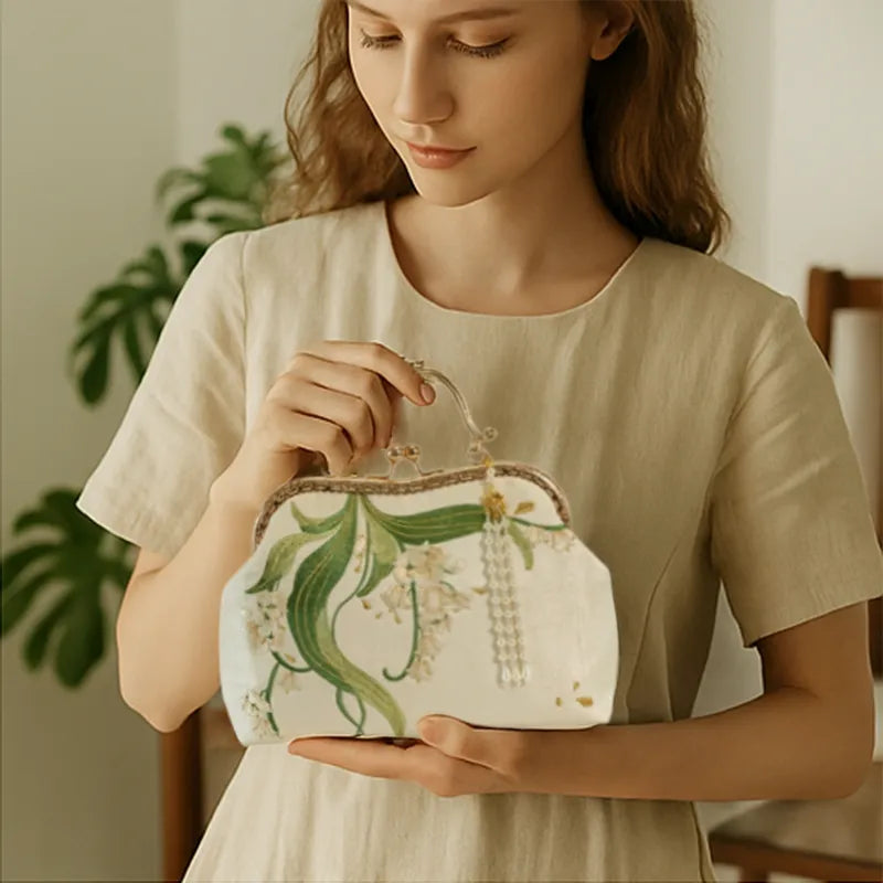 Lily of the Valley Embroidered Kiss-Lock White Handbag with Pearl Tassel