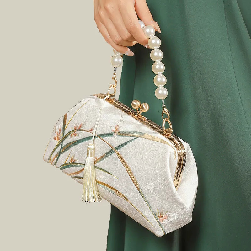 Orchid Bloom Embroidered Kiss-Lock Handbag with Pearl Handle