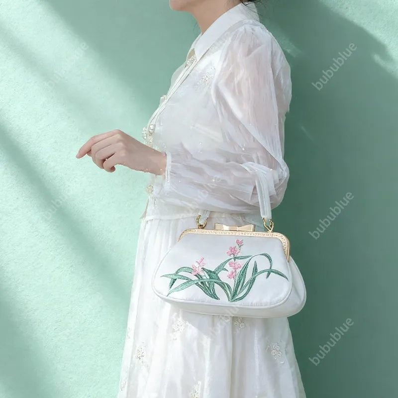 Vintage Orchid Embroidered Handbag with Metal Butterfly Lock