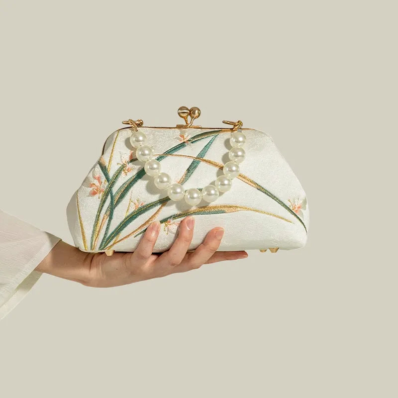 Orchid Bloom Embroidered Kiss-Lock Handbag with Pearl Handle