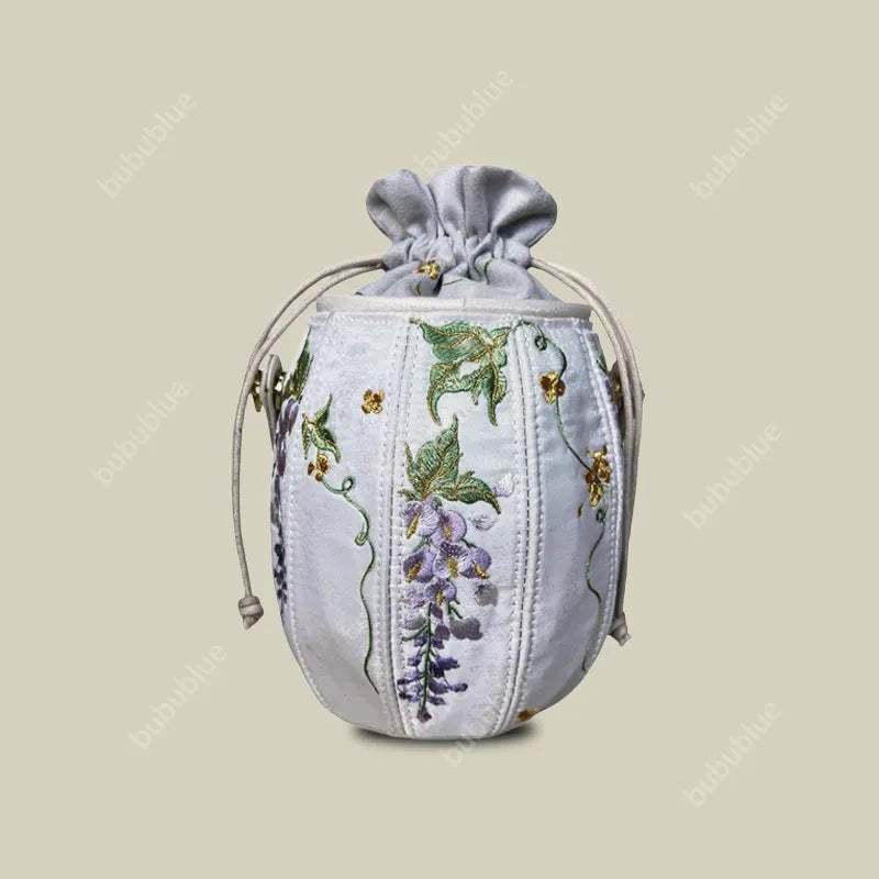 Wisteria Embroidered Drawstring Bucket Bag in Cream Satin