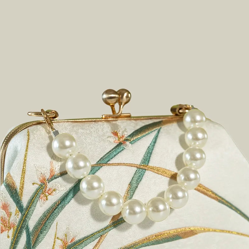 Orchid Bloom Embroidered Kiss-Lock Handbag with Pearl Handle