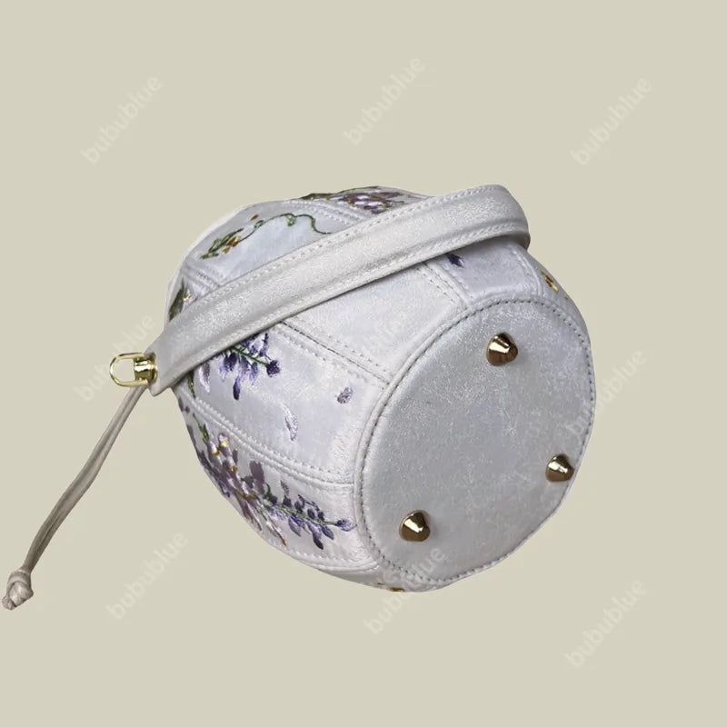 Wisteria Embroidered Drawstring Bucket Bag in Cream Satin