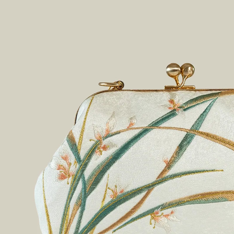 Orchid Bloom Embroidered Kiss-Lock Handbag with Pearl Handle