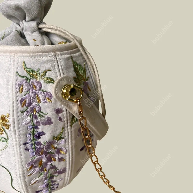 Wisteria Embroidered Drawstring Bucket Bag in Cream Satin