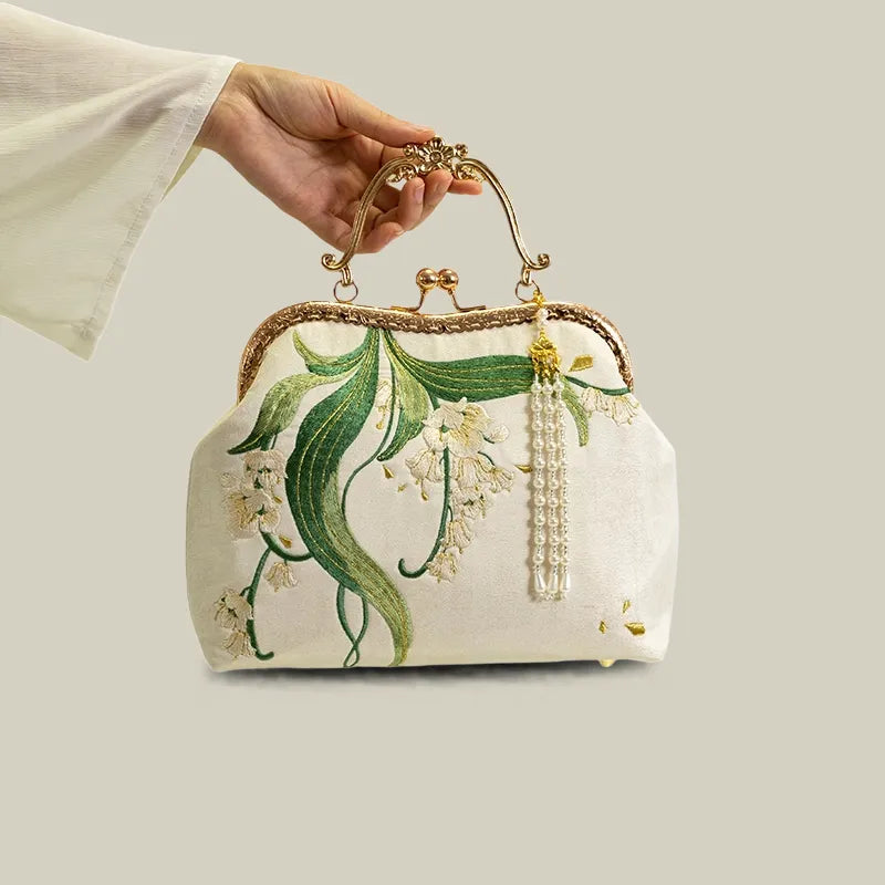 Lily of the Valley Embroidered Kiss-Lock White Handbag with Pearl Tassel