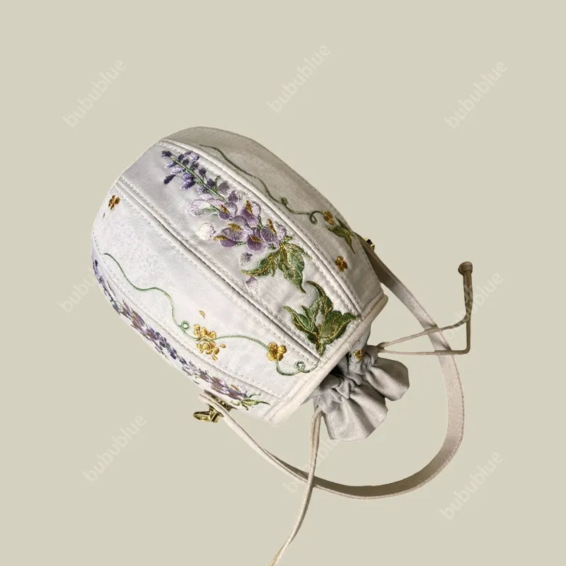 Wisteria Embroidered Drawstring Bucket Bag in Cream Satin