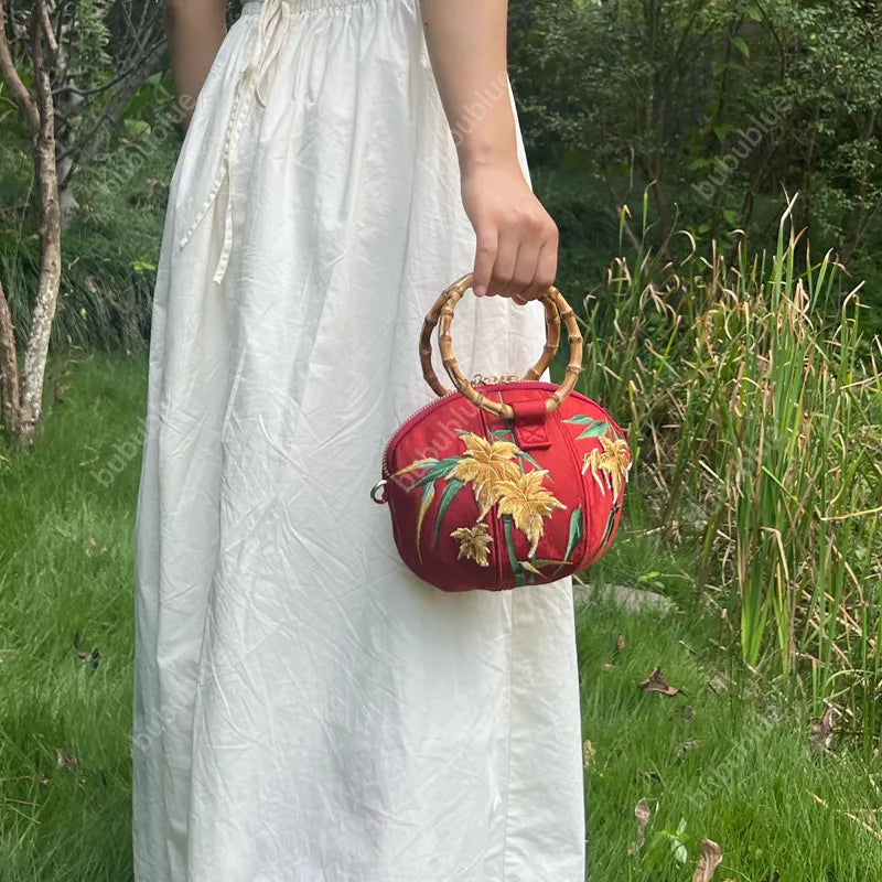 Maple Leaf Embroidered Pumpkin Handbag with Bamboo Handle