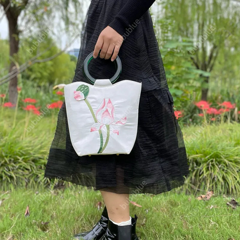 White Lotus Embroidered Tote Bag with Green Acrylic Handle