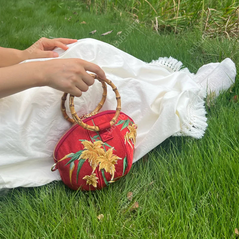 Maple Leaf Embroidered Pumpkin Handbag with Bamboo Handle