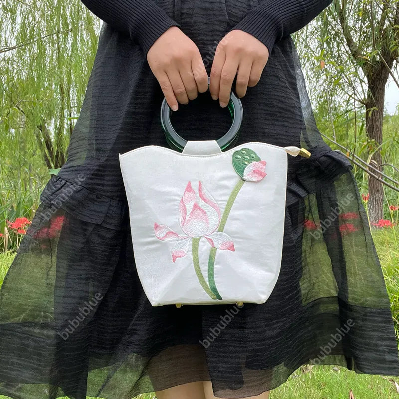 White Lotus Embroidered Tote Bag with Green Acrylic Handle