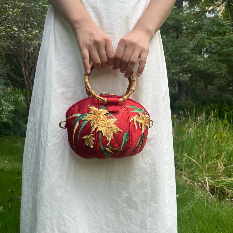 Maple Leaf Embroidered Pumpkin Handbag with Bamboo Handle