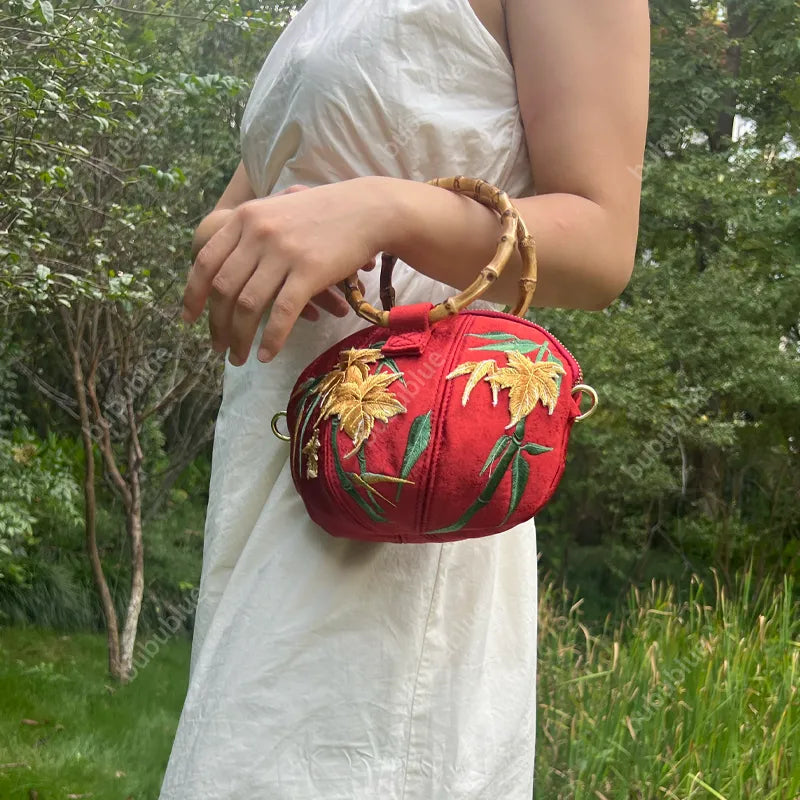 Maple Leaf Embroidered Pumpkin Handbag with Bamboo Handle
