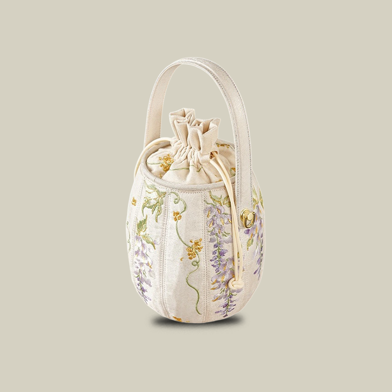 Wisteria Embroidered Drawstring Bucket Bag in Cream Satin