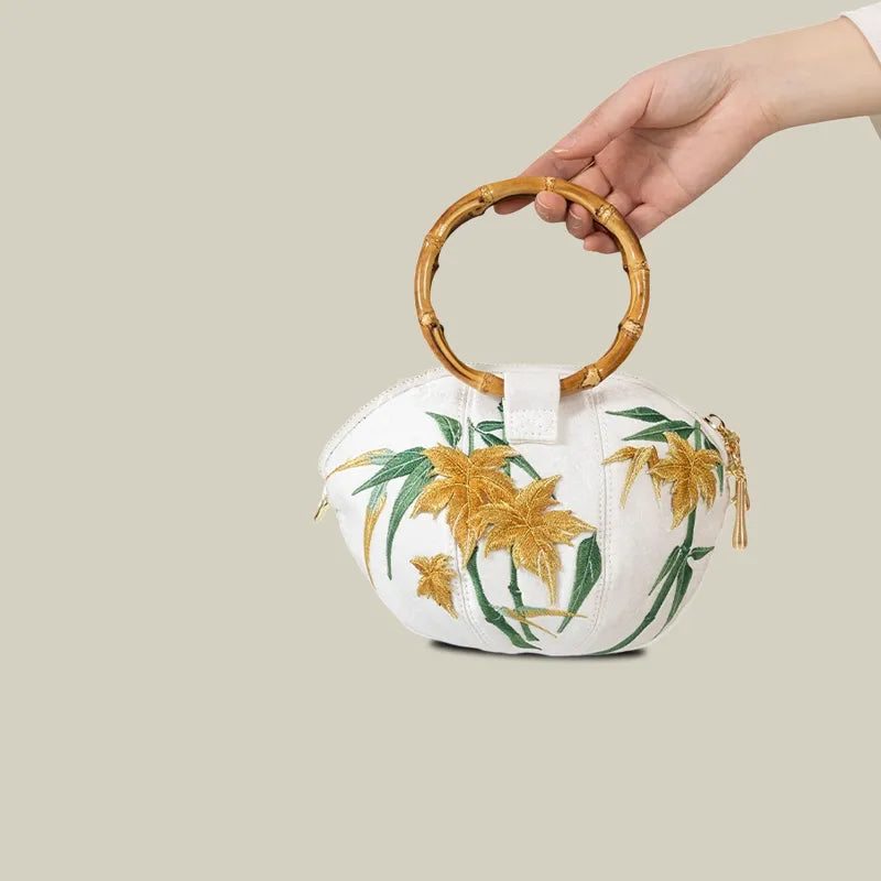 Maple Leaf Embroidered Pumpkin Handbag with Bamboo Handle