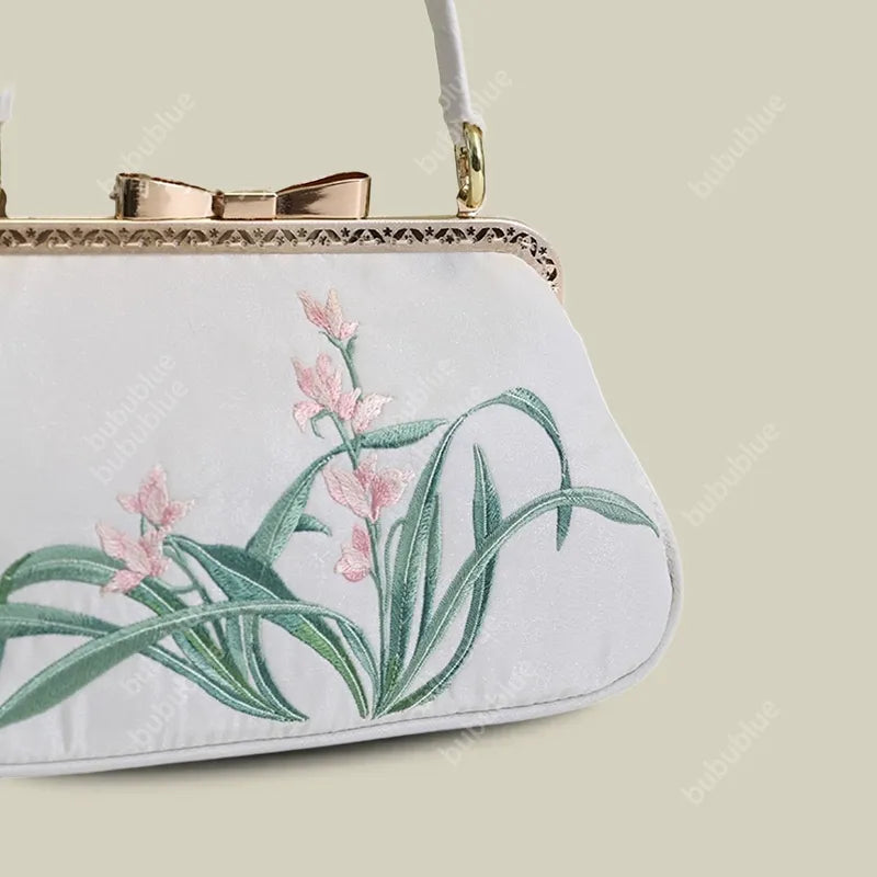 Vintage Orchid Embroidered Handbag with Metal Butterfly Lock