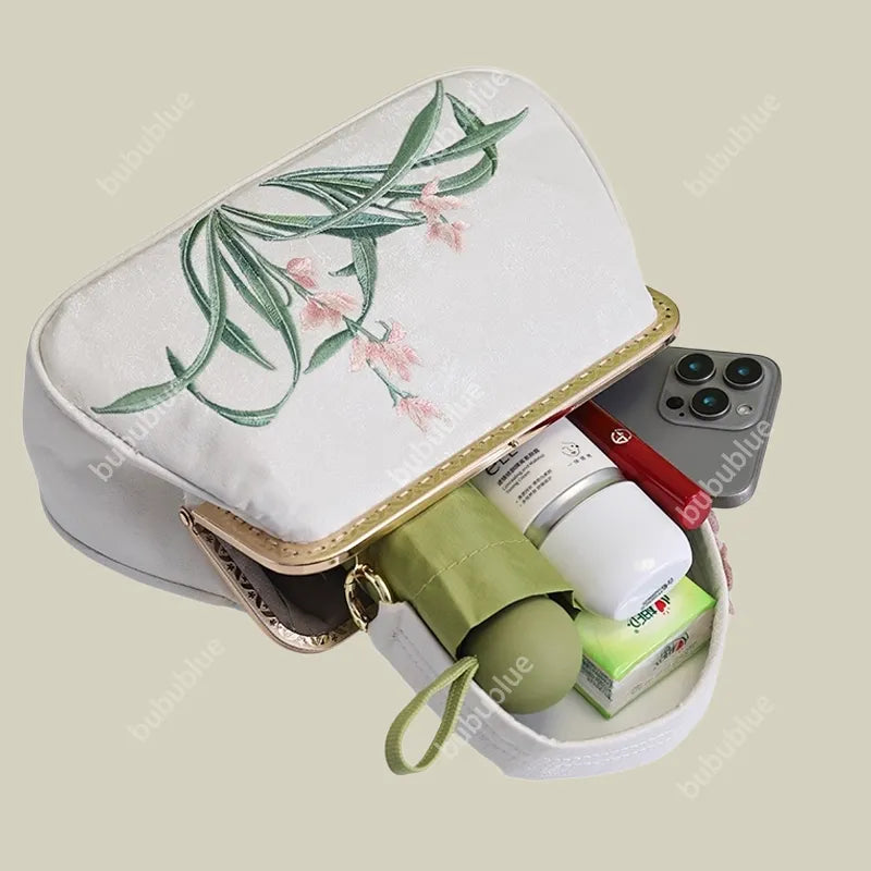 Vintage Orchid Embroidered Handbag with Metal Butterfly Lock