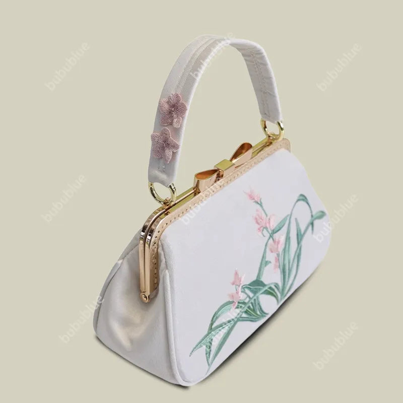 Vintage Orchid Embroidered Handbag with Metal Butterfly Lock