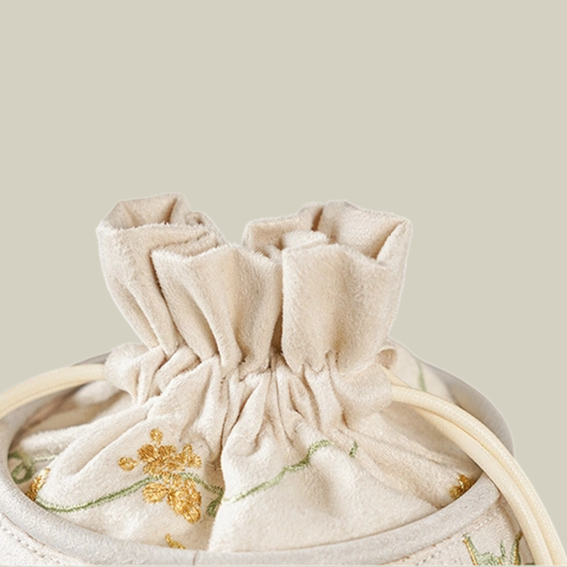 Wisteria Embroidered Drawstring Bucket Bag in Cream Satin