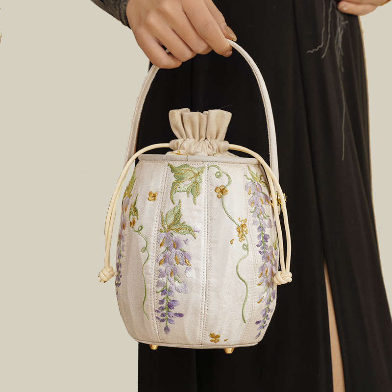 Wisteria Embroidered Drawstring Bucket Bag in Cream Satin