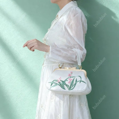 Vintage Orchid Embroidered Handbag with Metal Butterfly Lock
