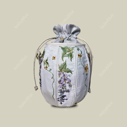 Wisteria Embroidered Drawstring Bucket Bag in Cream Satin