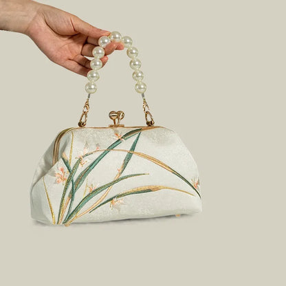 Orchid Bloom Embroidered Kiss-Lock Handbag with Pearl Handle