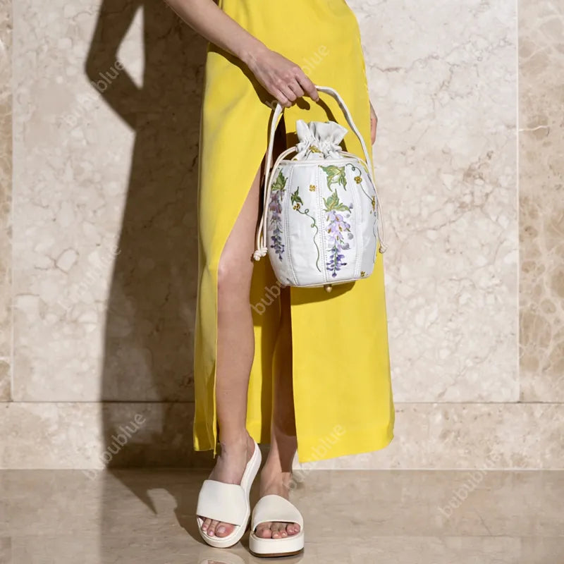 Wisteria Embroidered Drawstring Bucket Bag in Cream Satin