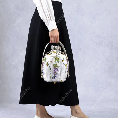 Wisteria Embroidered Drawstring Bucket Bag in Cream Satin
