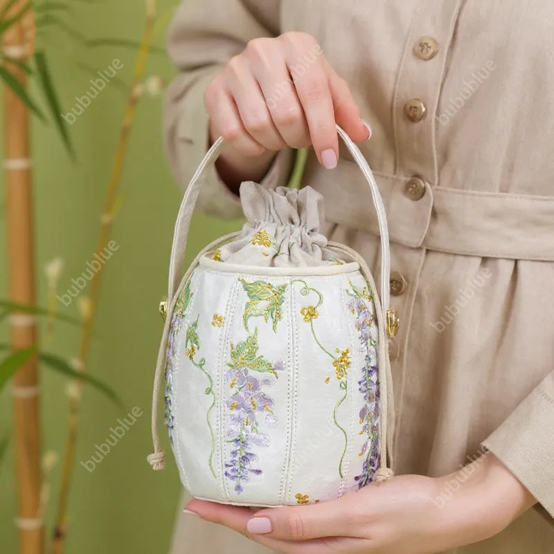 Wisteria Embroidered Drawstring Bucket Bag in Cream Satin