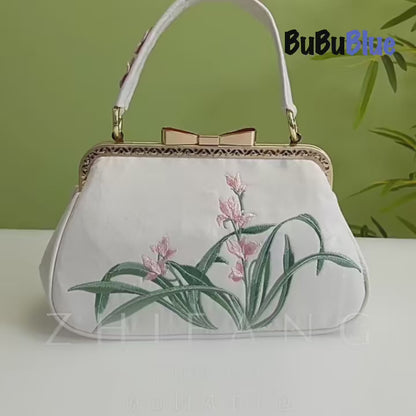 Vintage Orchid Embroidered Handbag with Metal Butterfly Lock