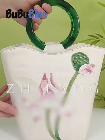 White Lotus Embroidered Tote Bag with Green Acrylic Handle
