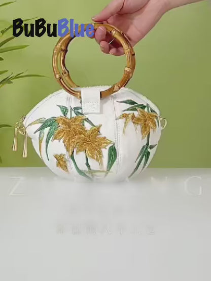 Maple Leaf Embroidered Shell Handbag with Bamboo Handle
