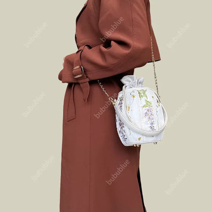 Wisteria Embroidered Drawstring Bucket Bag in Cream Satin