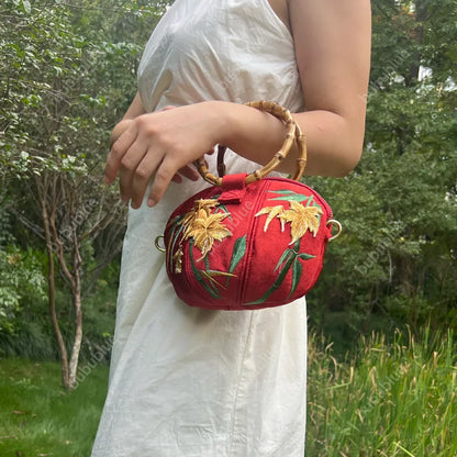 Maple Leaf Embroidered Pumpkin Handbag with Bamboo Handle