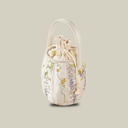 Wisteria Embroidered Drawstring Bucket Bag in Cream Satin