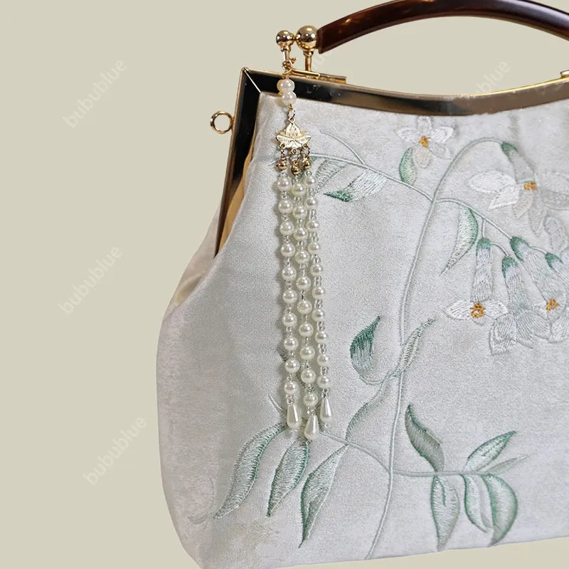 White Pear Blossom Embroidered Kiss Lock Clutch with Pearl Tassel