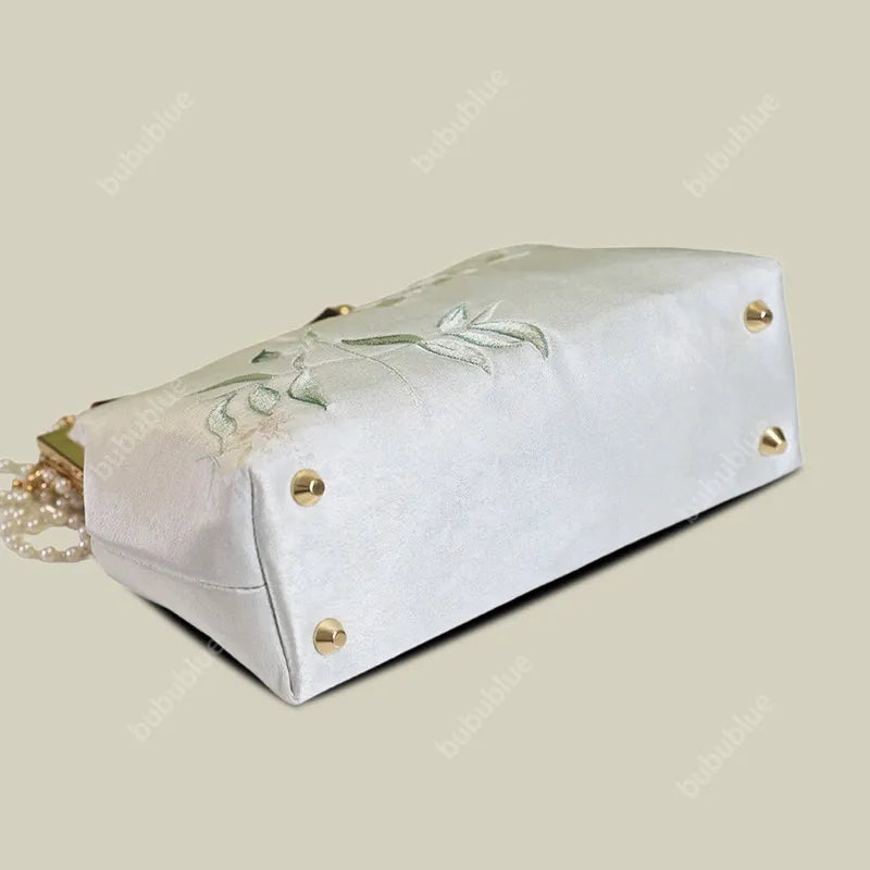 White Pear Blossom Embroidered Kiss Lock Clutch with Pearl Tassel
