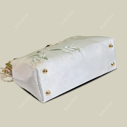 White Pear Blossom Embroidered Kiss Lock Clutch with Pearl Tassel