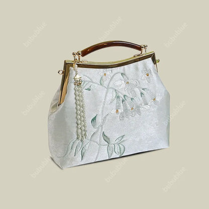 White Pear Blossom Embroidered Kiss Lock Clutch with Pearl Tassel