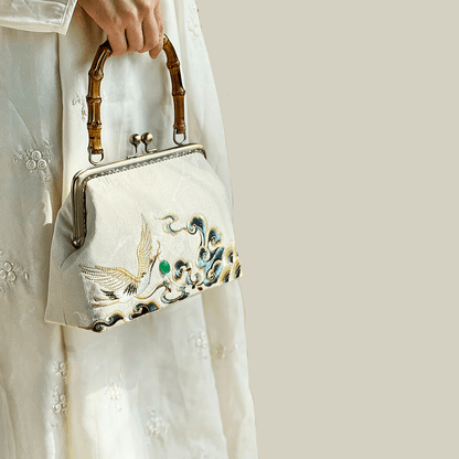 Embroidered Crane Handbag with Metal Kiss Lock