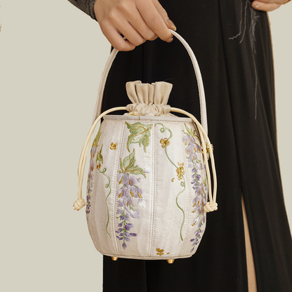Wisteria Embroidered Drawstring Bucket Bag in Cream Satin