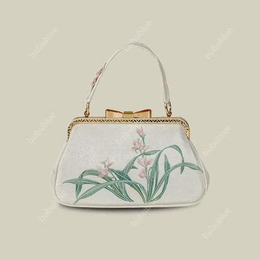 Vintage Orchid Embroidered Handbag with Metal Butterfly Lock