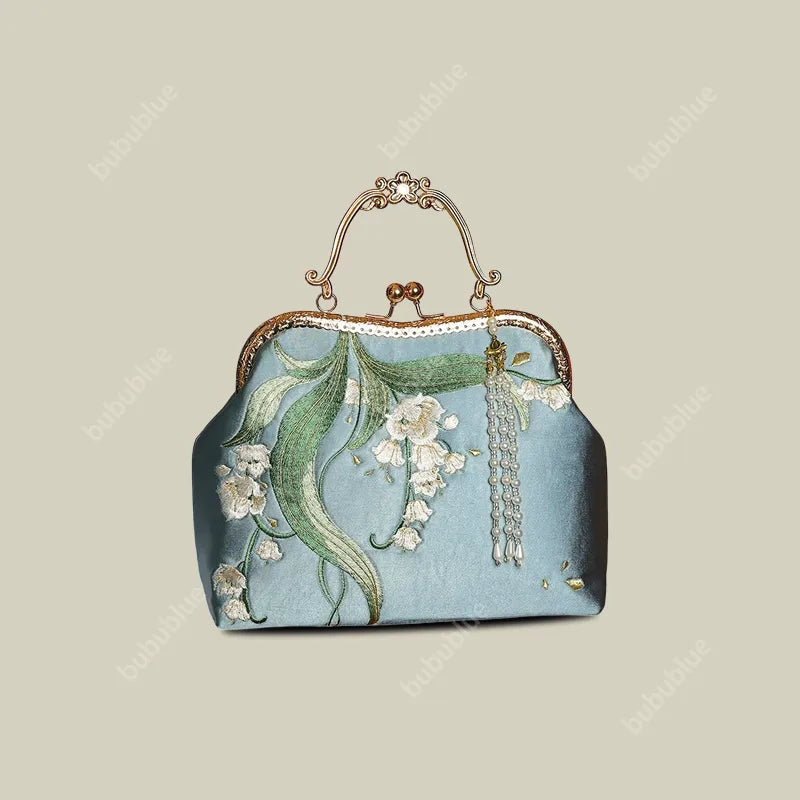 Lily of the Valley Embroidered Kiss-Lock White Handbag with Pearl Tassel