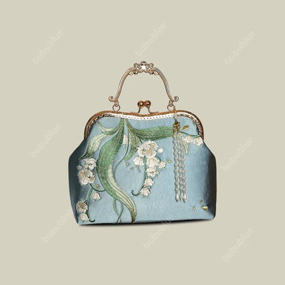 Lily of the Valley Embroidered Kiss-Lock White Handbag with Pearl Tassel
