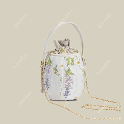 Wisteria Embroidered Drawstring Bucket Bag in Cream Satin