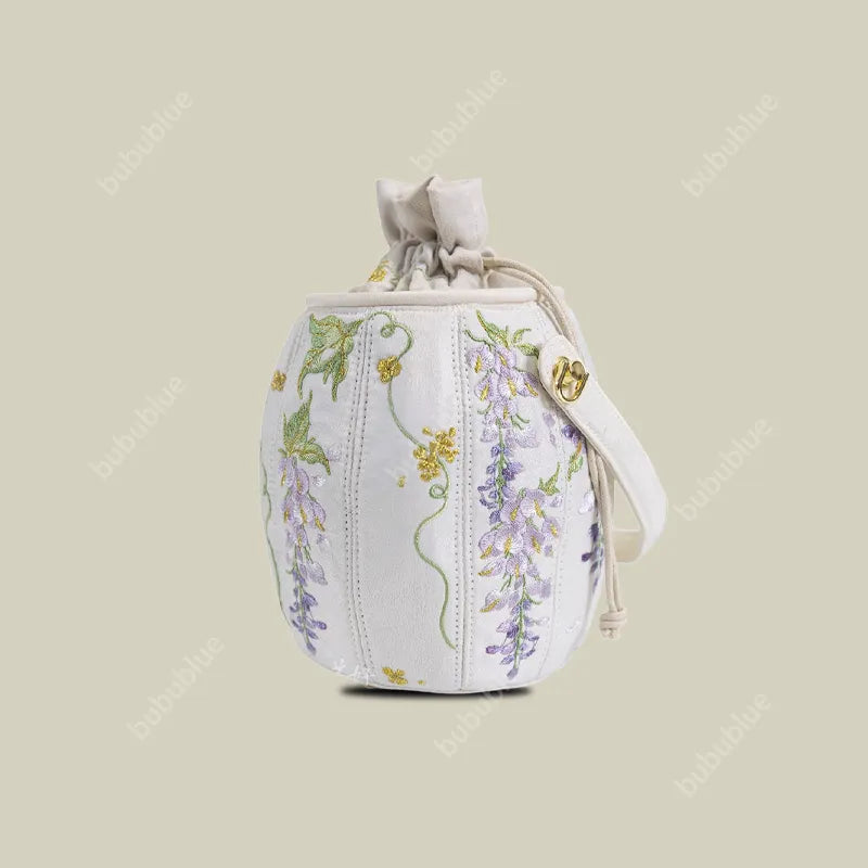 Wisteria Embroidered Drawstring Bucket Bag in Cream Satin